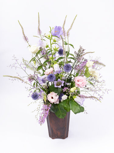Bouquet of purple, pink and white flowers (light background)