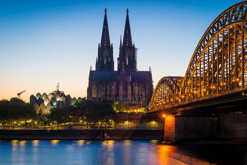 Cathedral and Hohenzollern Bridge in Cologne by Martin Wasilewski