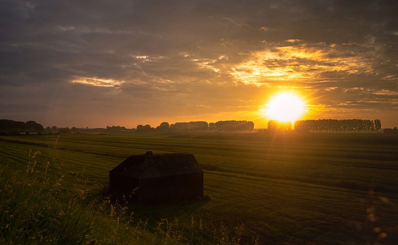 Old bunker during sunrise by Nynke Altenburg
