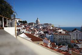 Lisbon in the morning - light over rooftops and hills by Rachel Mein