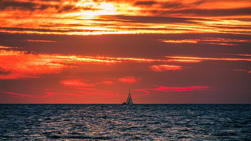 Sunset on the beach by Mustafa Kurnaz