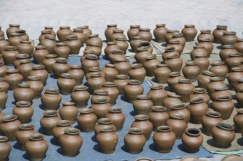 Bottom of potsBhaktapur, Nepal: Pottery Square. Symmetrical rows of traditional pots