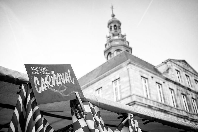 Carnival fabrics for sale at the market in Maastricht by Streets of Maastricht