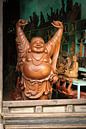 A very large wooden, cheerful Buddha statue by Dirk Verwoerd thumbnail