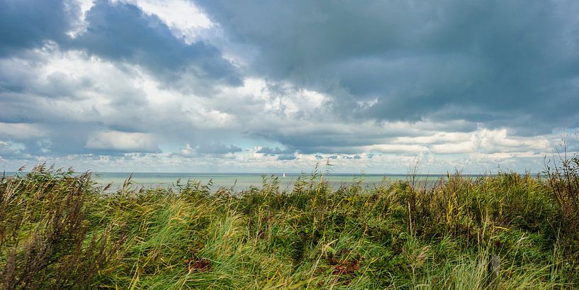  Menacing Sky Over Sea seen from the dune.  by Dirk Huckriede