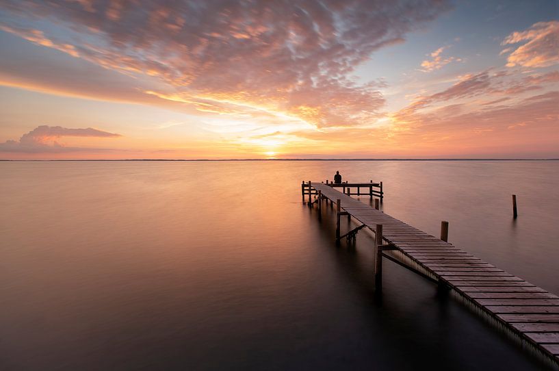 Zonsondergang op een steiger van Claire Droppert