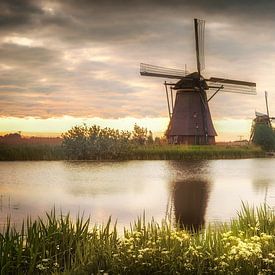 Windmills in Holland at sunrise. by Voss Fine Art Fotografie