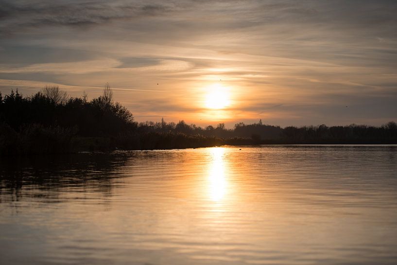 Een winterse zonsondergang van As Janson