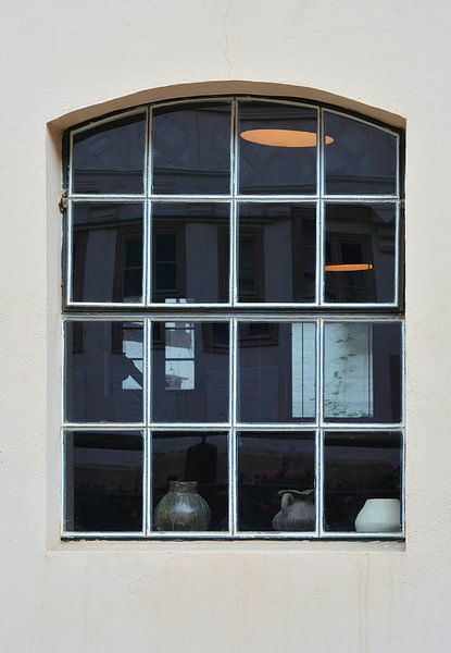 Window on a residential house in the old town of Quedlinburg by Heiko Kueverling