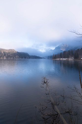 Beautiful View with great Light over the Alpsee in Bavaria - Lake Picture in Moody Winter Landscape with empty Space