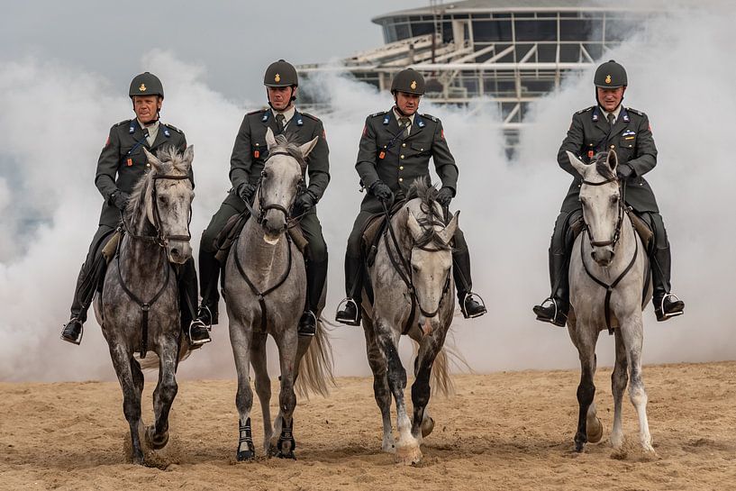 Paarden door de rook, op het schevingse strand by Erik van 't Hof