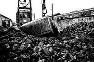 Old vintage crane with bucket removes coal from a lot to load a locomotive by Fotografiecor .nl thumbnail