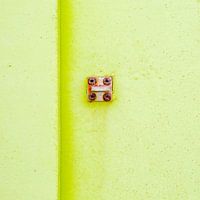 Abstract of pastel green on a rusty panel
