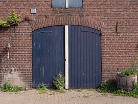 Romantic farm scene with old door and barrel by Robin Jongerden