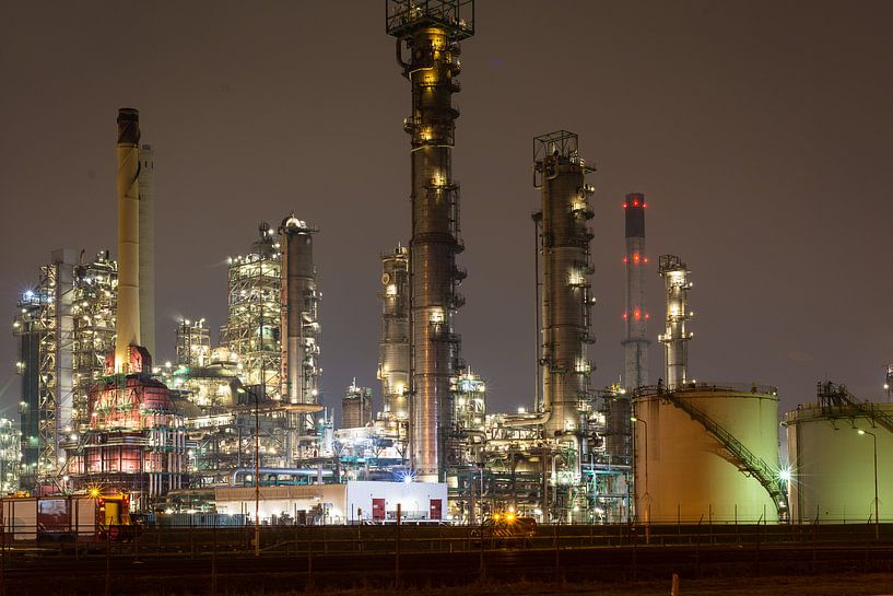 Petrochemical landscape at night by Menno van der Haven