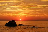 Sunset Staining Sky And Sea In Orange