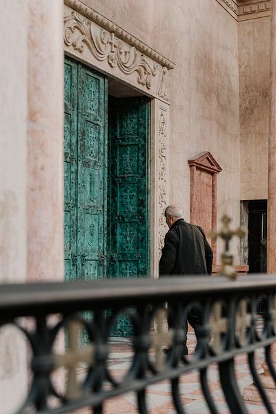 Man walks into a building by Moniek Kuipers