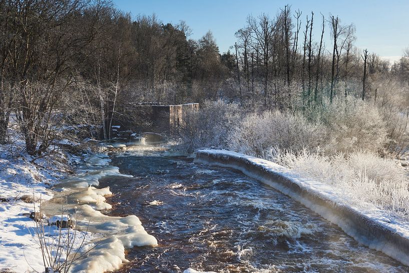 running water in sweden in winter by Geertjan Plooijer