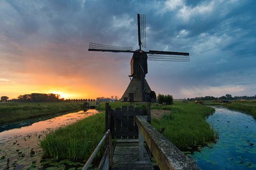 Polder mill at sunrise