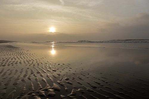 zonsondergang aan het strand