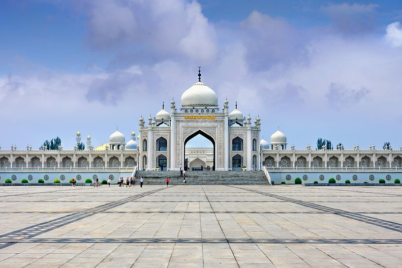 White mosque at Hui Cultural center against a blue sky  by Tony Vingerhoets