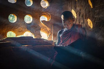 Young monk in the temples of Bagan by Roland Brack