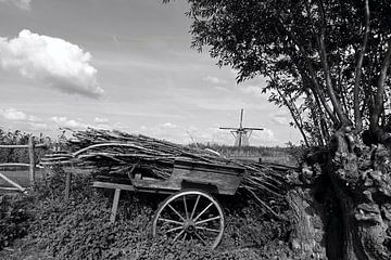 landschap met boerenkar en molen op achtergrond van W J Kok