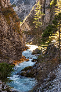 Waterfall flowing through the Gleiersch Gorge near Scharnitz in the Austrian Alps.