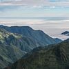 Wolkenvelden vanaf de Stille Oceaan in de Andes uitlopers van Ecuador sur Lex van Doorn