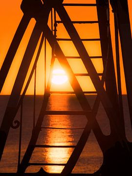 Zonsondergang en de vuurtoren van Stavoren