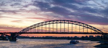 Sunrise over the river Waal and the Four Days Marches by Lex Schulte