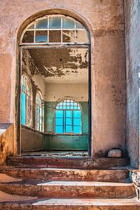 Interior of an abandoned house in Kolmanskop, Namibia by Rietje Bulthuis