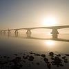 Zeeland bridge in the morning mist by Jan Jongejan