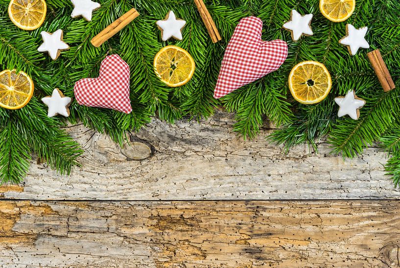 Christmas hearts with natural decoration on rustic wood background by Alex Winter