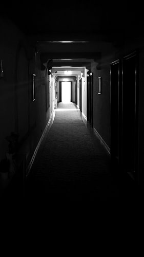 Light at the end of the tunnel – A dark corridor in black and white