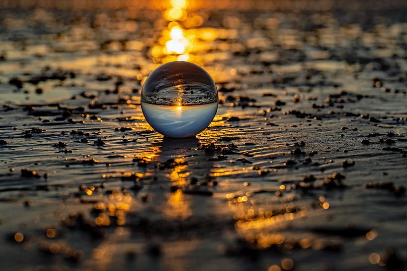 Zonsondergang in de bol van Thomas Riess
