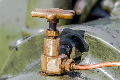 Geel koperen kraantje