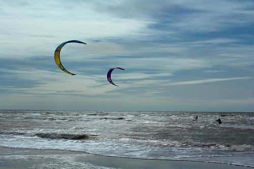 'Kitesurfers in the North Sea, near the Maasvlakte beach.'