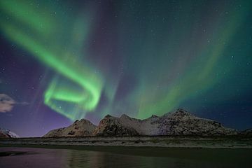 Northern lights over the mountain by Tilo Grellmann