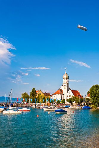 Zeppelin over moated castle on Lake Constance by Werner Dieterich