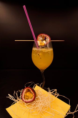 Aperitief met verse passievrucht.