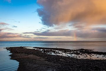 Rainbow above the water by Adrianne Dieleman
