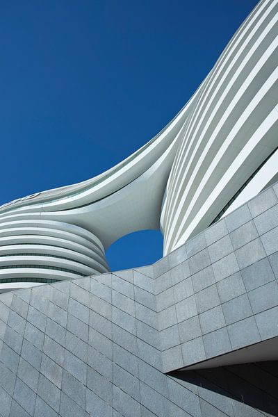 SOHO Galaxy office building against a blue sky by Tony Vingerhoets