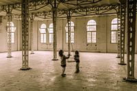 girls playing in the old factory