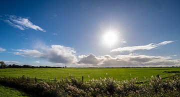 Hollands Landschap met dreigende wolken.