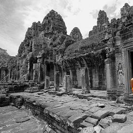Monk in ruins of Angkor Wat in Cambodia by Jan Fritz