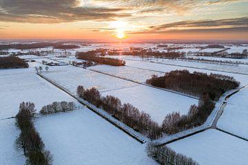 Sunset over a snowy winter landscape by Sjoerd van der Wal Photography