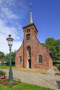 The lovely Hasselt Chapel with a green lantern in front by Tony Vingerhoets