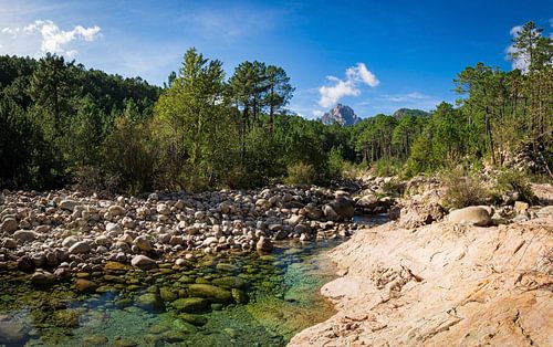Rock formation and reflection in Solenzara River, Corsica, France