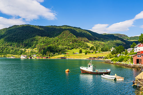 View of the Åkrafjord with a fishing boat in Norway